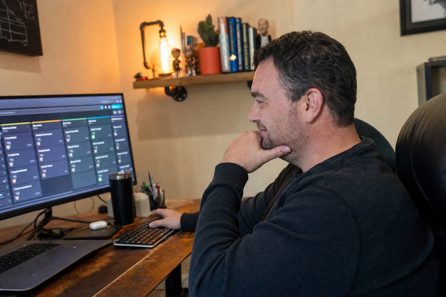 A sales manager reviewing an opportunity pipeline on a desktop dashboard